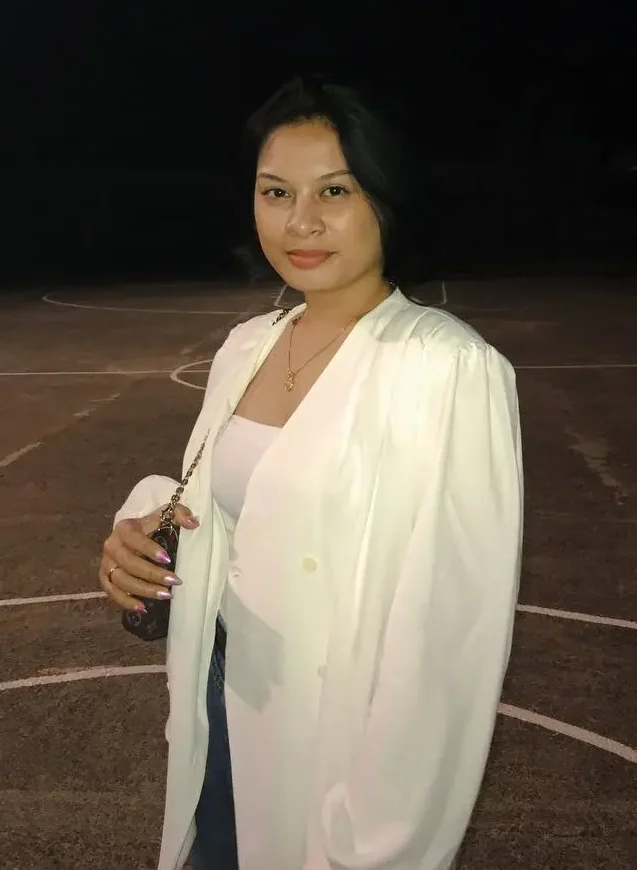 a girl wearing white blazer